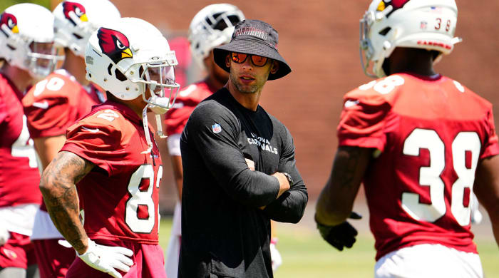 Jonathan Gannon wearing a bucket hat at his first Cardinals OTAs.